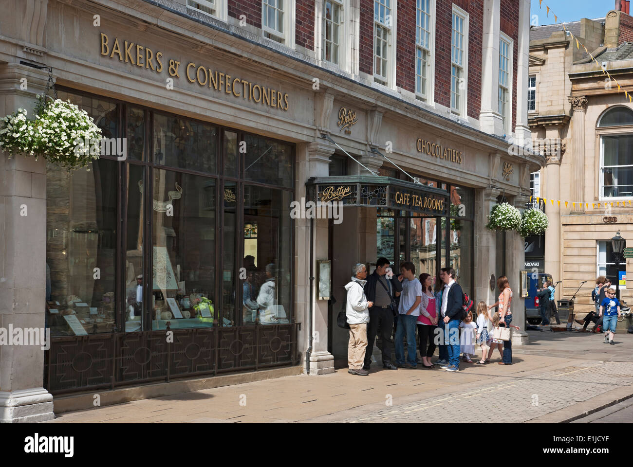 People queuing outside Bettys Cafe Tea Rooms Davygate York North Yorkshire England UK United Kingdom GB Great Britain Stock Photo