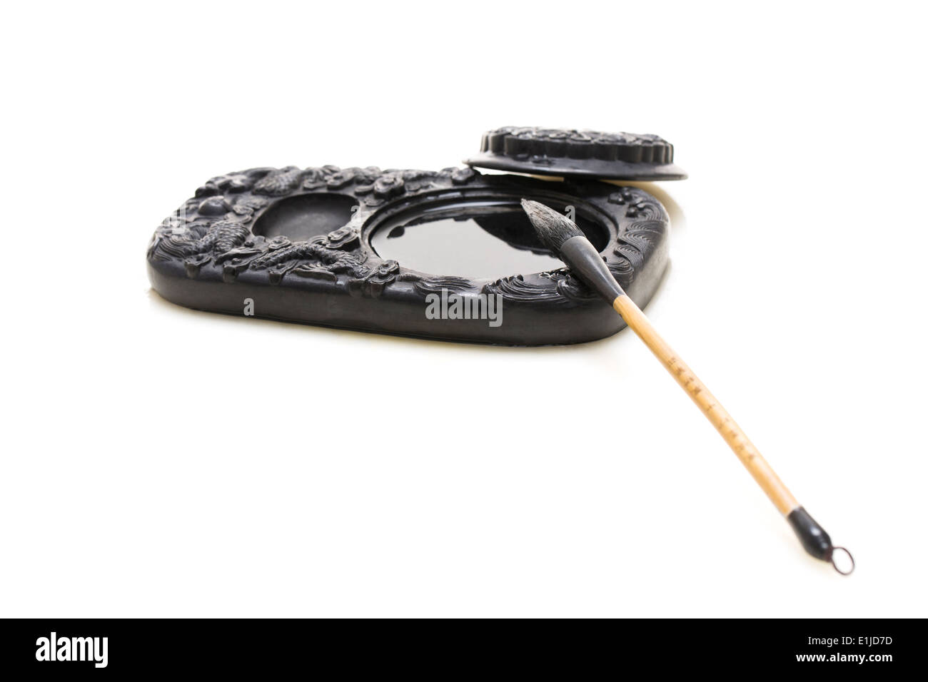 Inkstone and writing brush Stock Photo