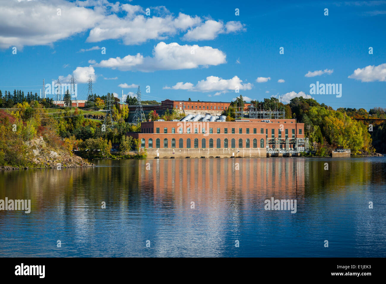 The Hydro Quebec electrical power plant reflected in the Saint-Maurice River in Shawinigan, Quebec, Canada. Stock Photo