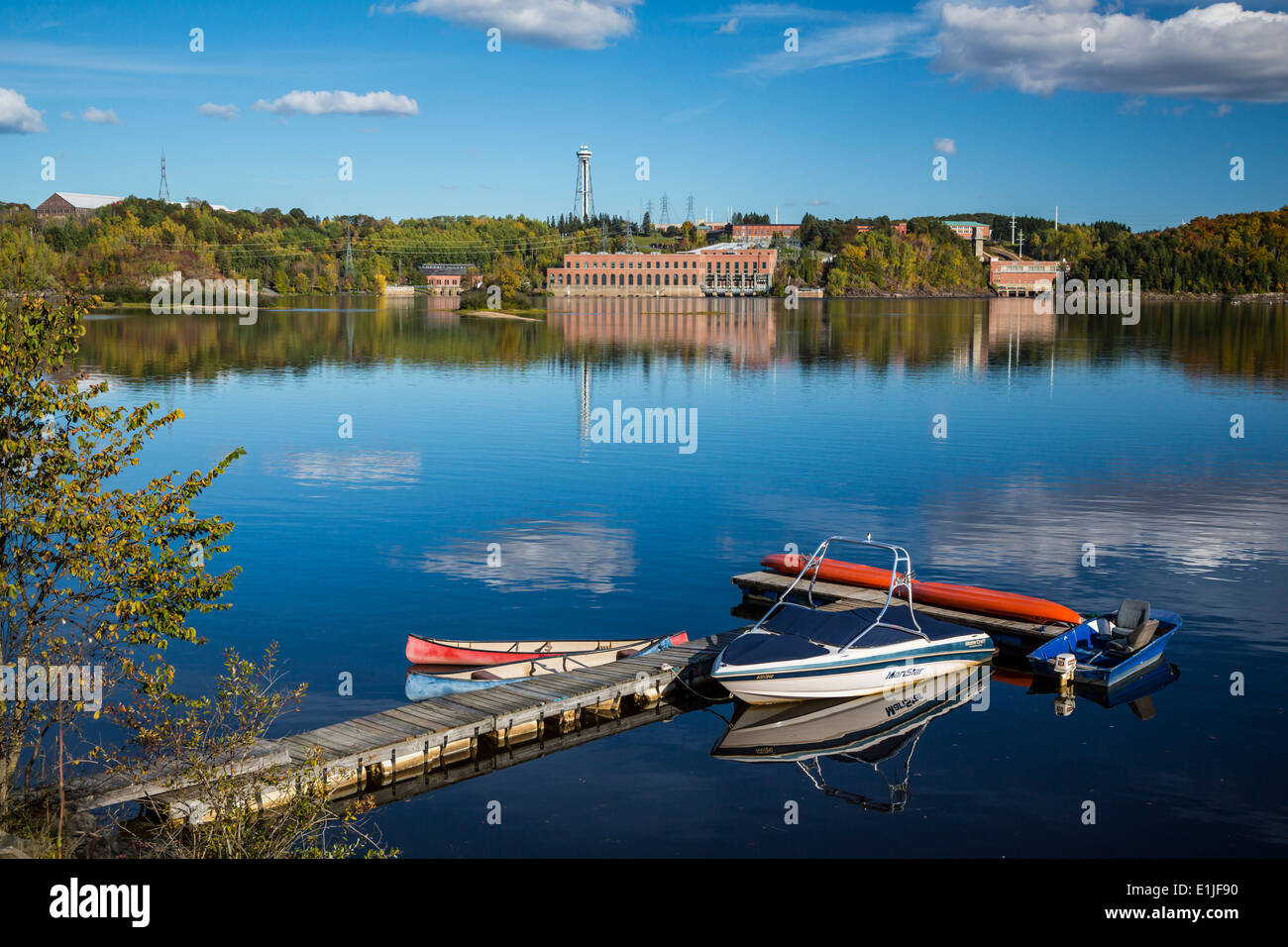 A small boat dock on the Saint-Maurice River in Shawinigan, Quebec, Canada. Stock Photo