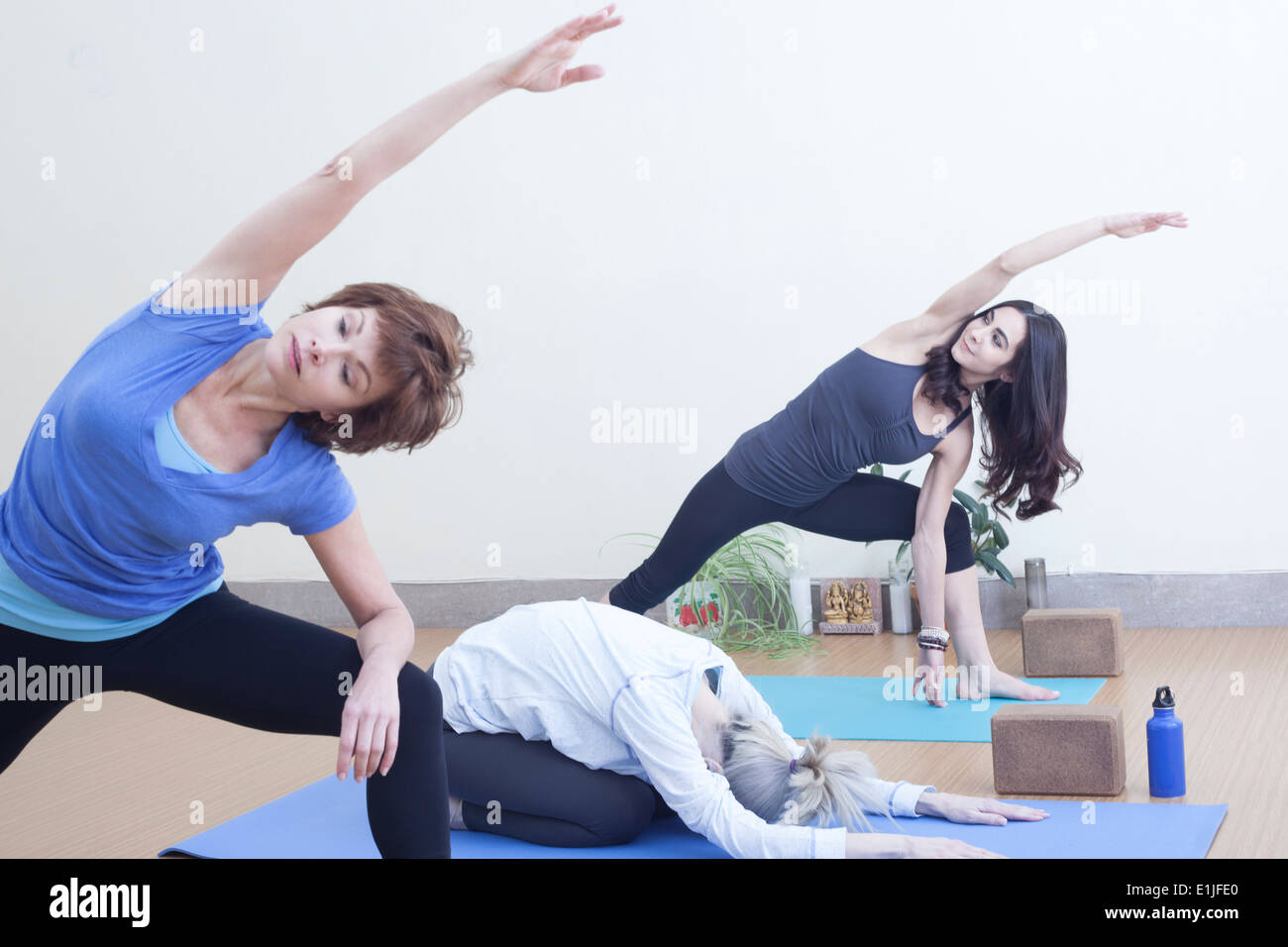 Women practising yoga Stock Photo - Alamy