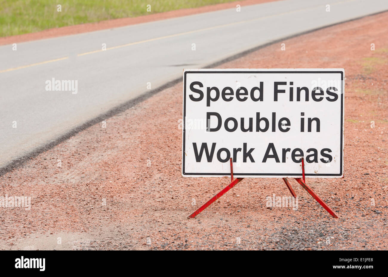Speed fines double in work area sign Stock Photo Alamy