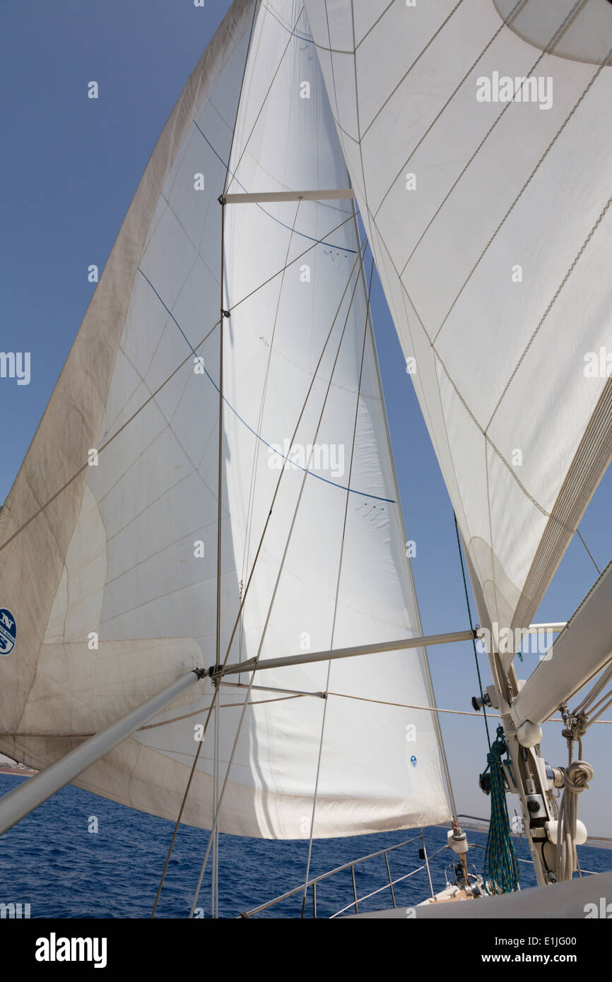 Marami 2000 yacht in full sail on the Mediterranean Sea, with coast of Cyprus ahead. Stock Photo