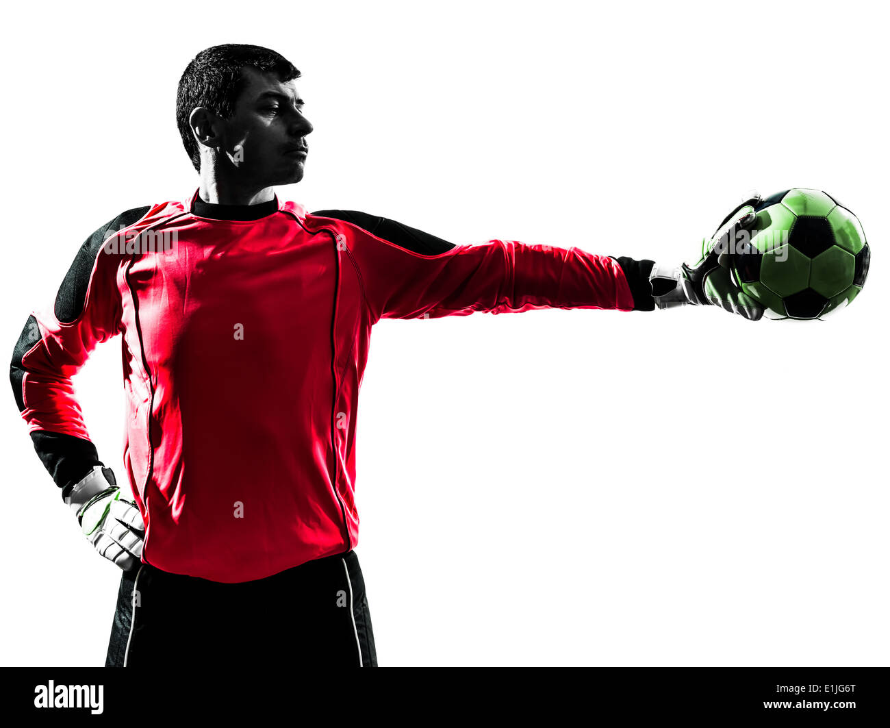 one soccer player goalkeeper man standing stopping ball with one hand