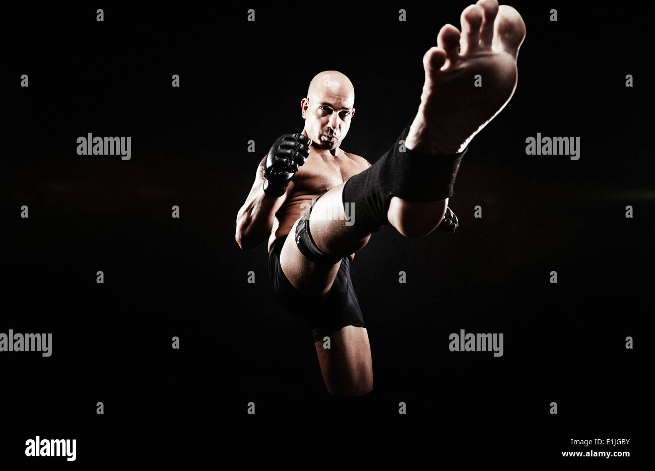 Mature man kickboxing Stock Photo - Alamy