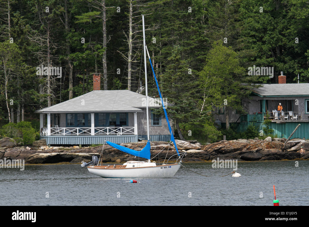 A Cape Dory Typhoon Sailboat on a mooring Stock Photo