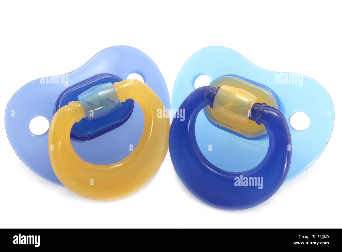 Two pacifiers close-up on a white background Stock Photo