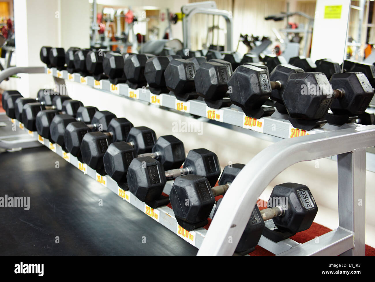 Dumbbell Rack Row View of rows of dumbbells on the rack at the gym Stock Photo - Alamy