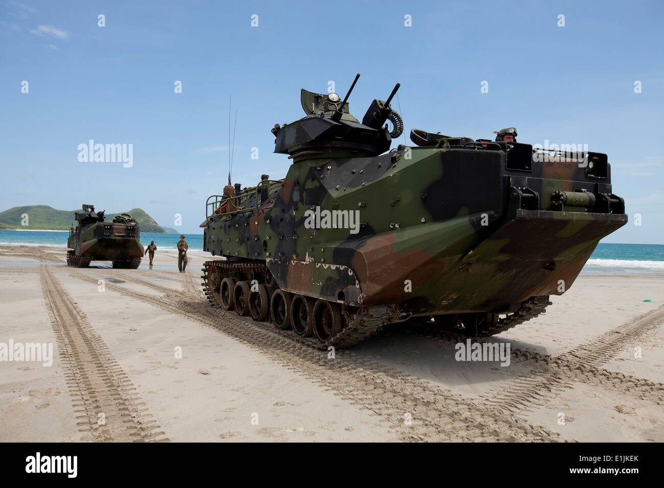 U.S. Marines with the 3rd Marine Division, III Marine Expeditionary Force position their assault amphibious vehicles on the bea Stock Photo