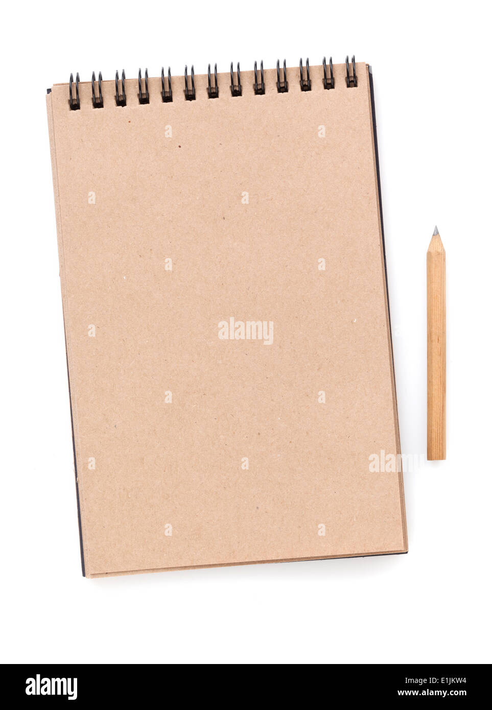 Brown paper notepad with pencil. Isolated on white background Stock