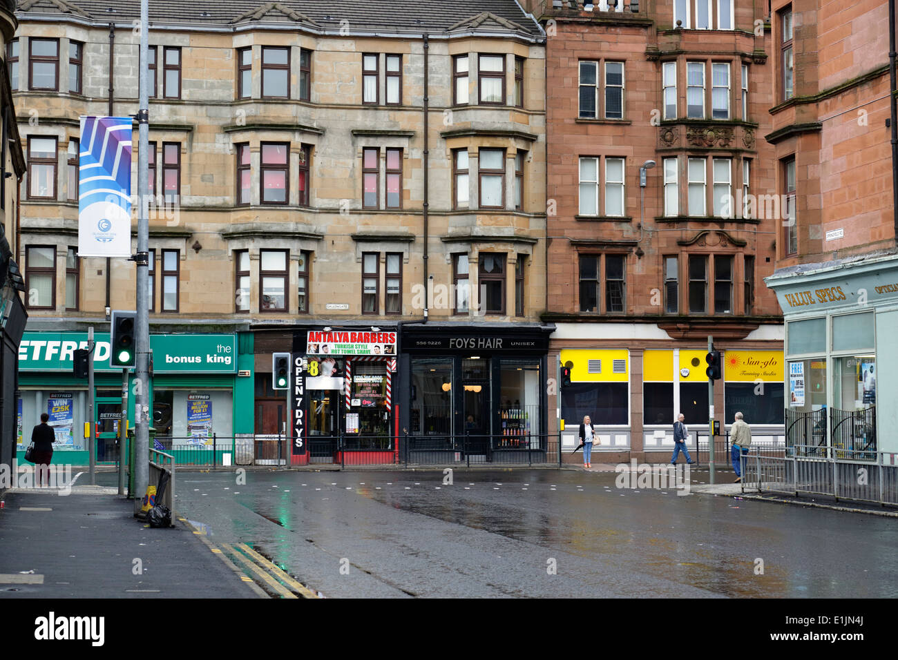 View along Springfield Road to the Gallowgate in Parkhead, East End of Glasgow, Scotland, UK Stock Photo