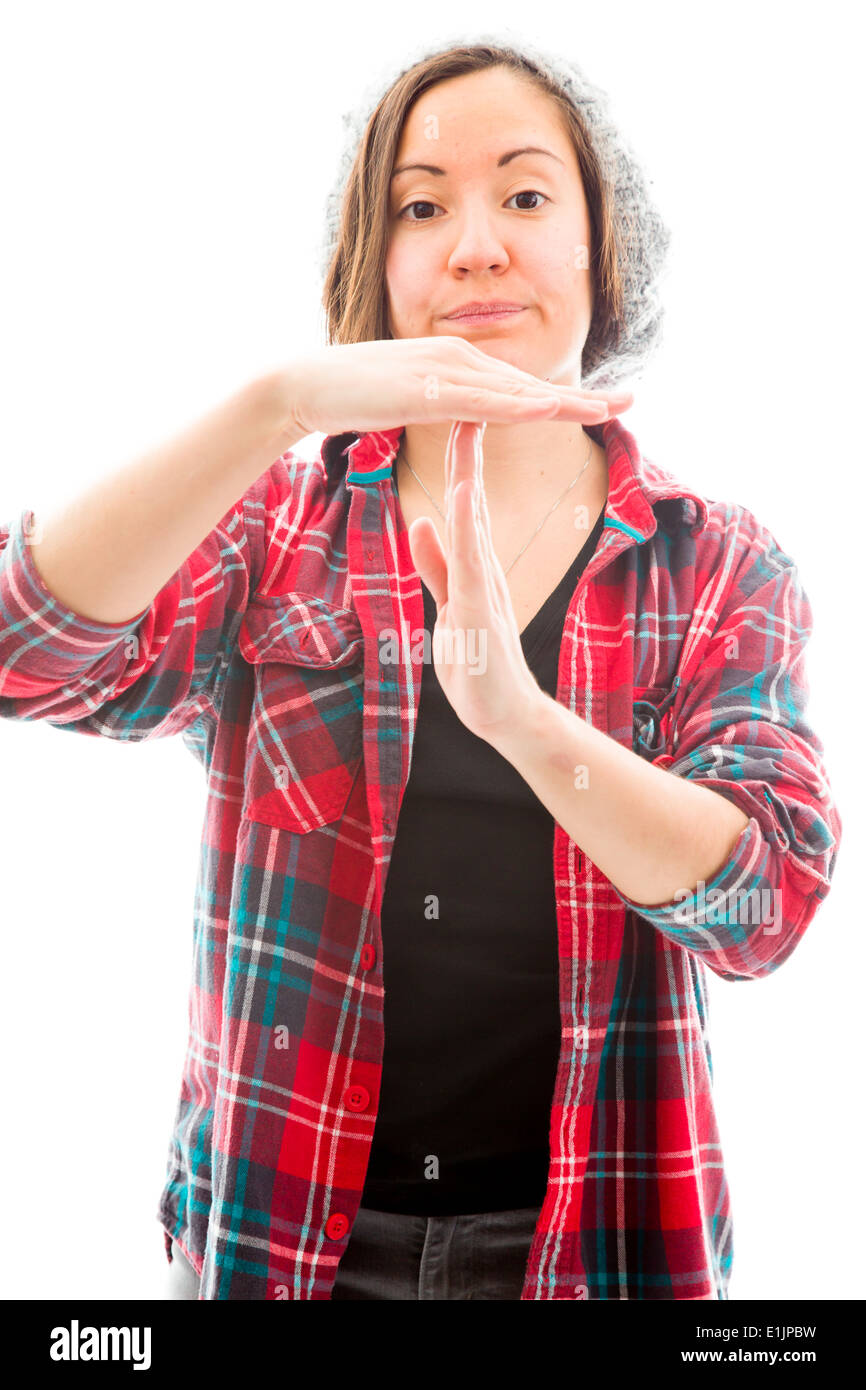 Young woman making time out signal with hands Stock Photo