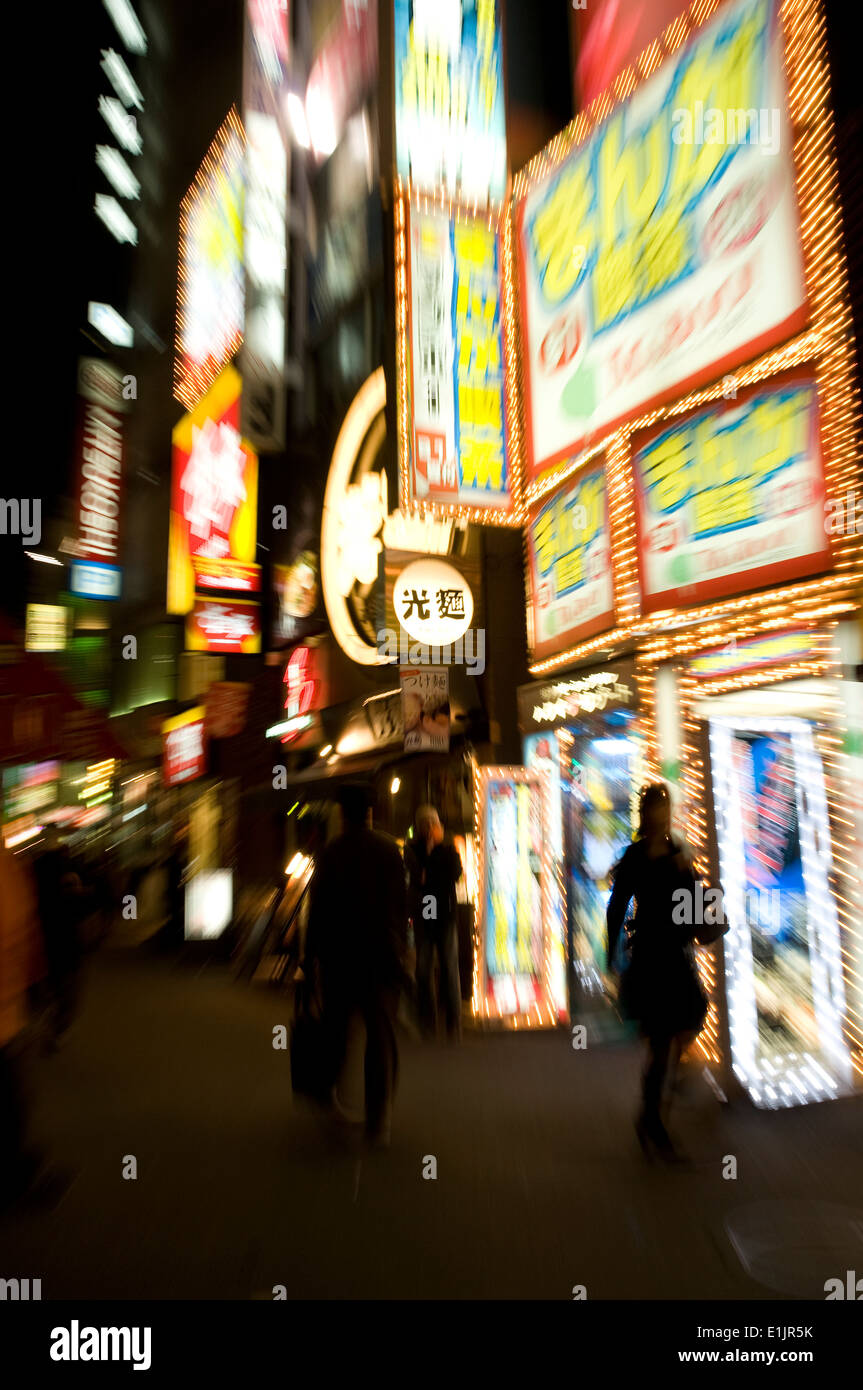 Flashing neon sign at night in Tokyo, Japan. Stock Photo