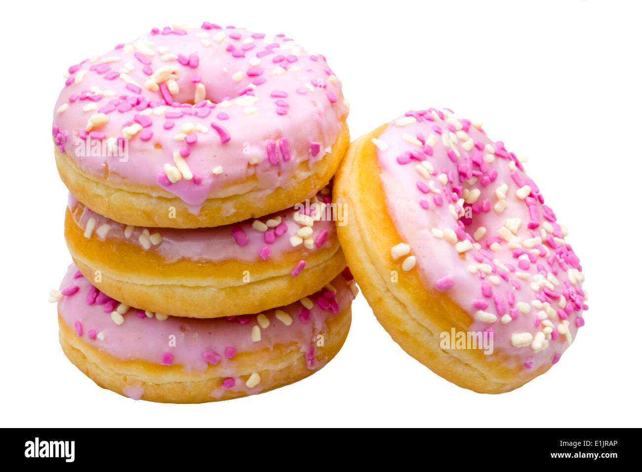 Ring Doughnuts with sprinkles & pink icing. Donuts glazed with strawberry glaze. Stock Photo