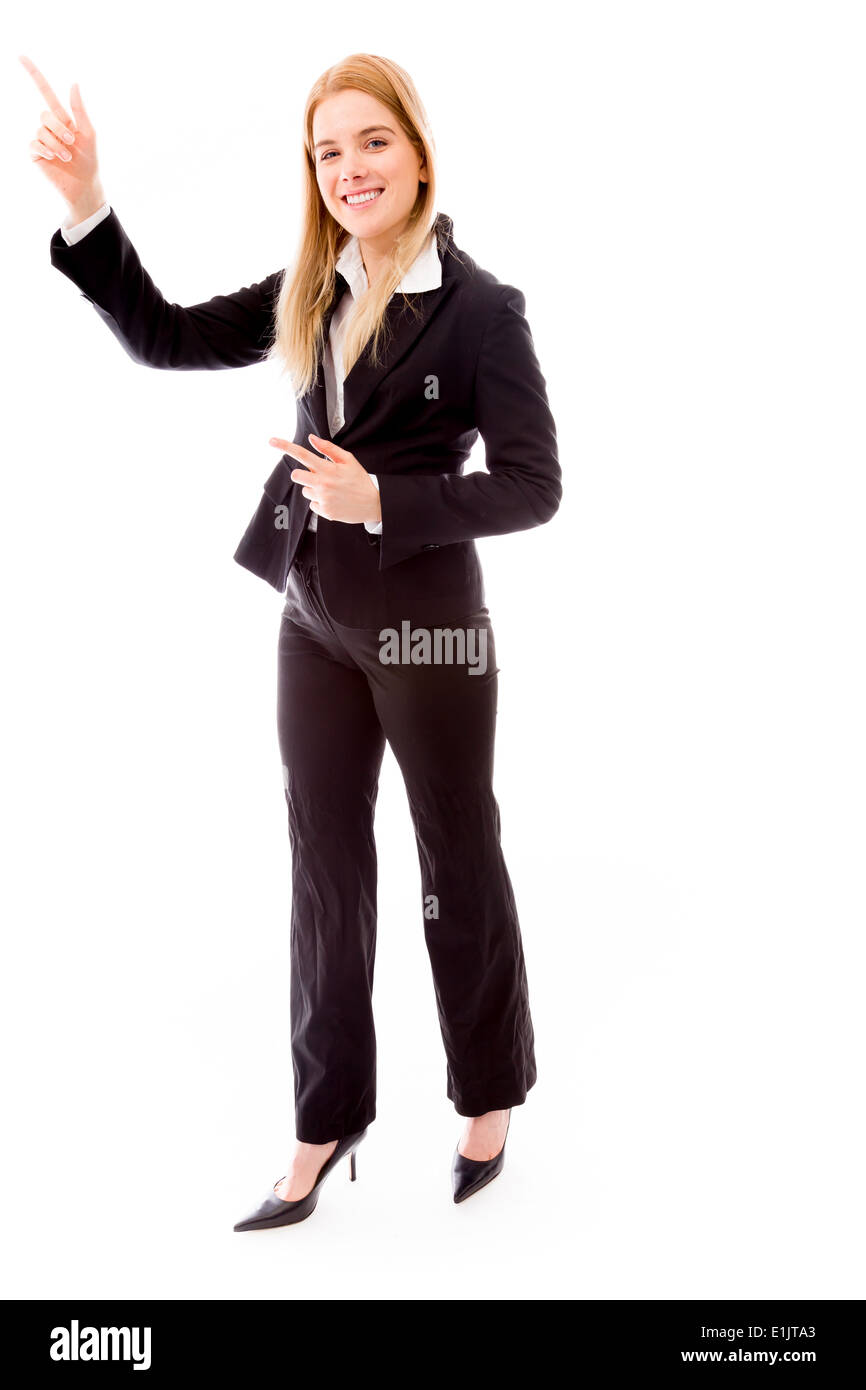 Businesswoman pointing upward Stock Photo