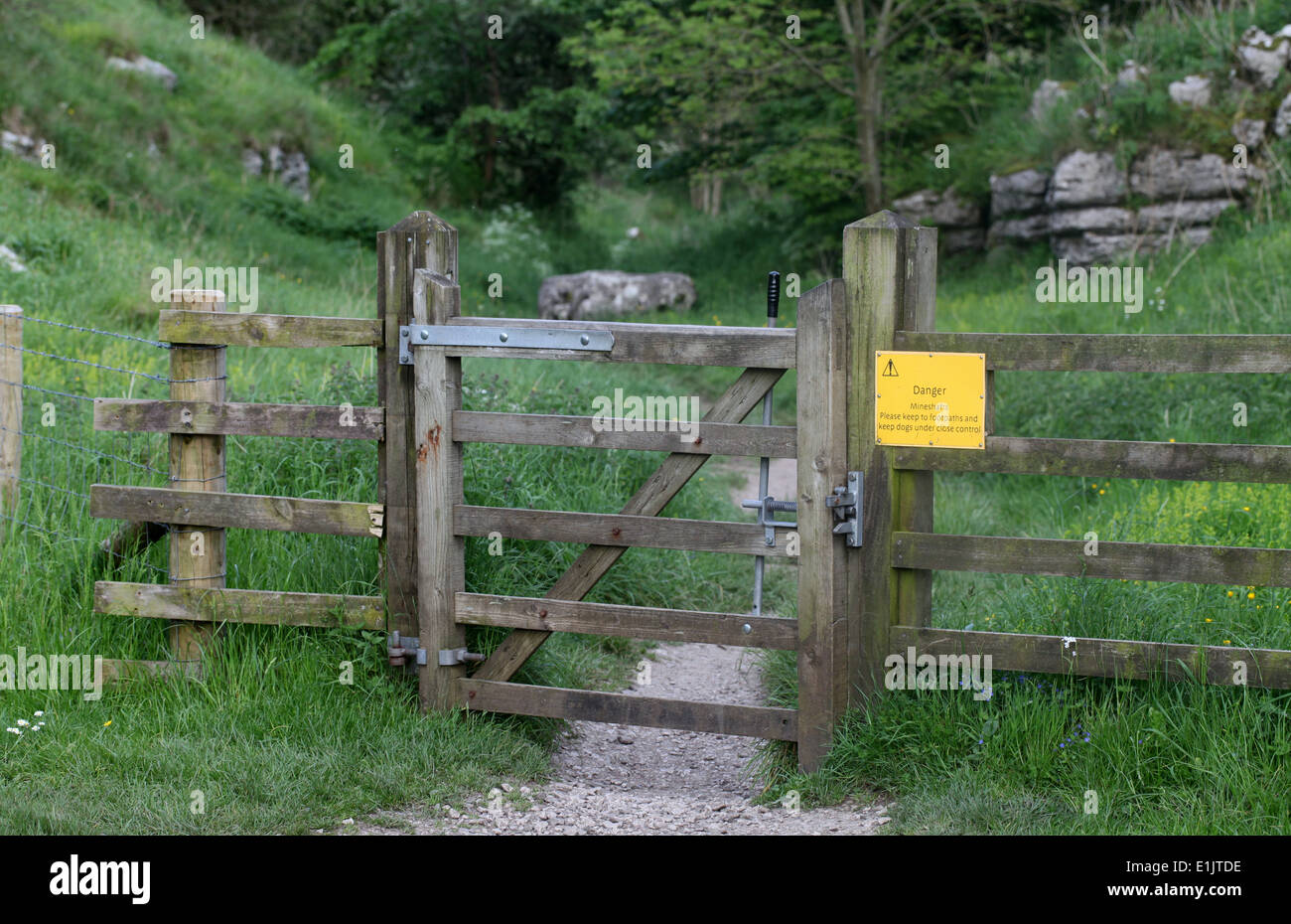 Danger of Mineshafts Sign at Lathkill Dale in the Derbyshire Peak District National Park Stock Photo