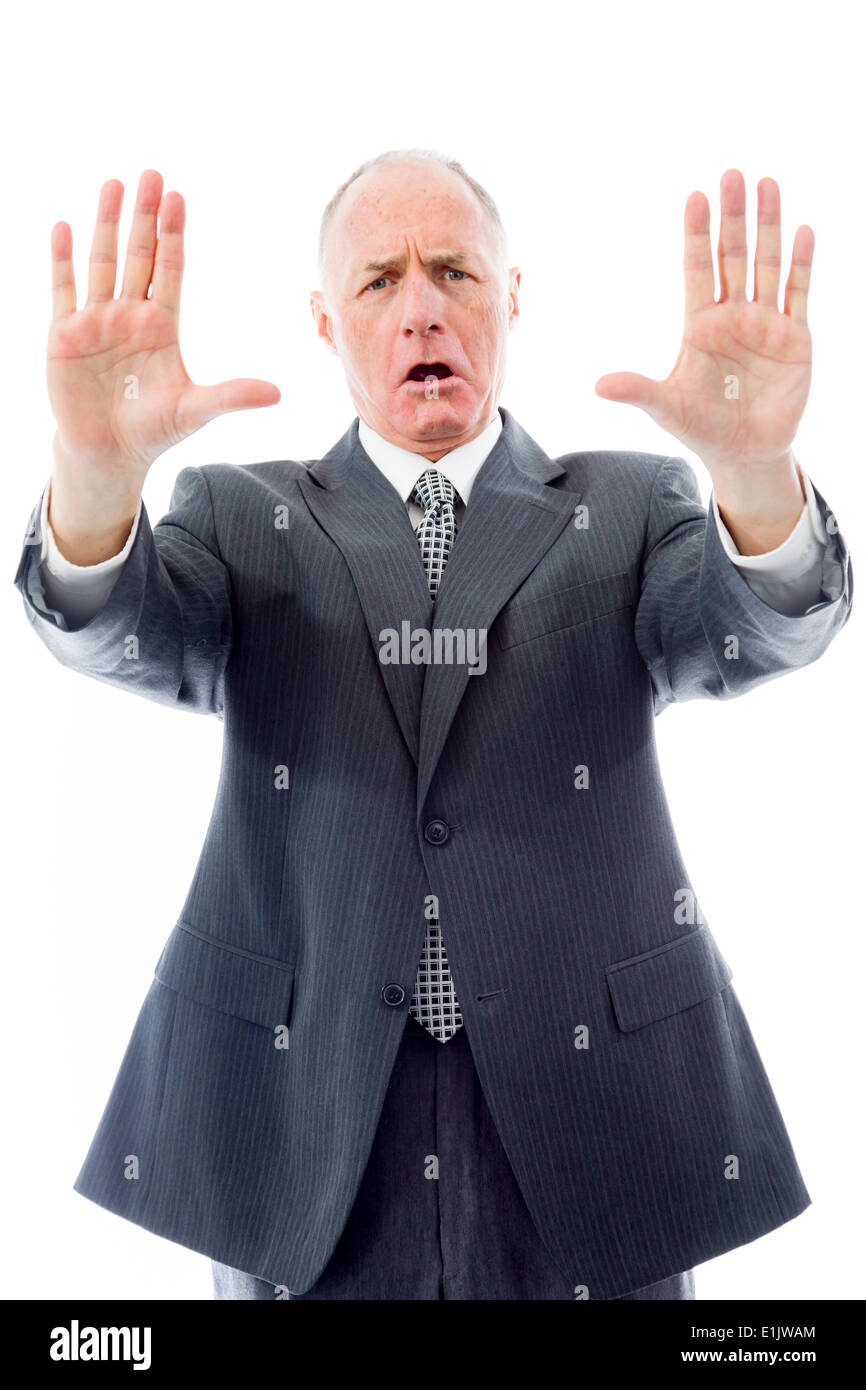 Businessman stopping with hand gesture Stock Photo