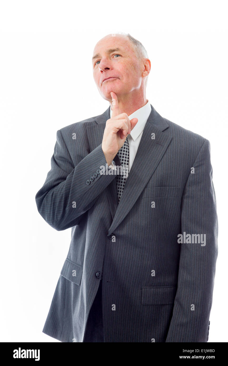 Businessman day dreaming Stock Photo