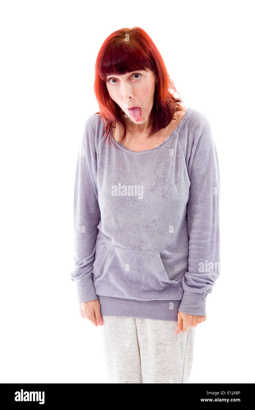 Mature woman sticking out her tongue Stock Photo