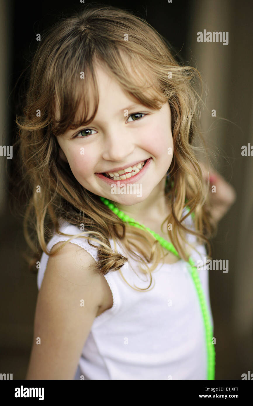 Portrait of a pretty young girl smiling Stock Photo - Alamy