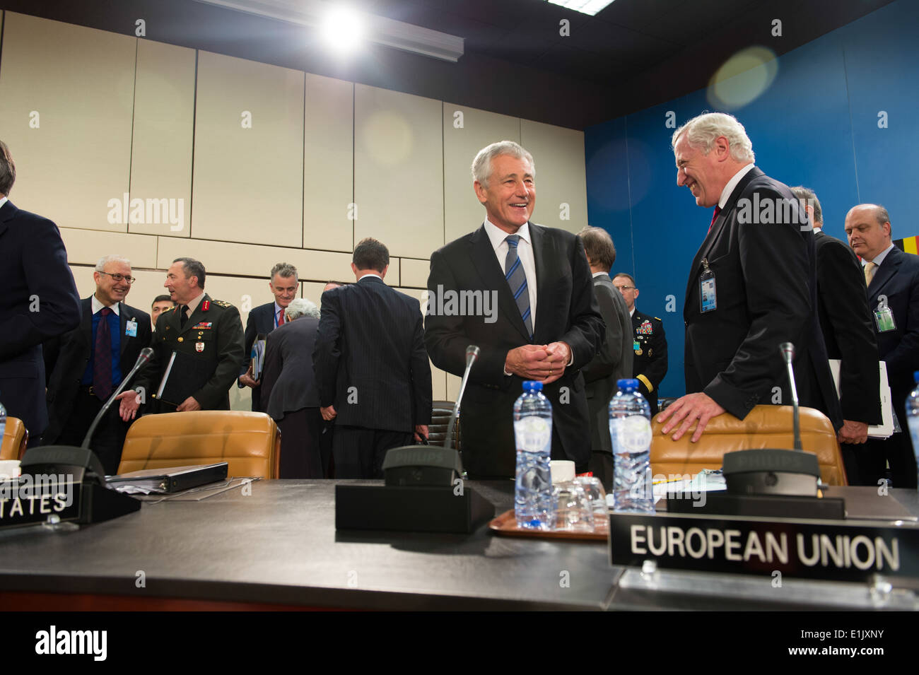 Secretary of Defense Chuck Hagel meets with foreign delegates during the North Atlantic Council meeting at the NATO Headquarter Stock Photo