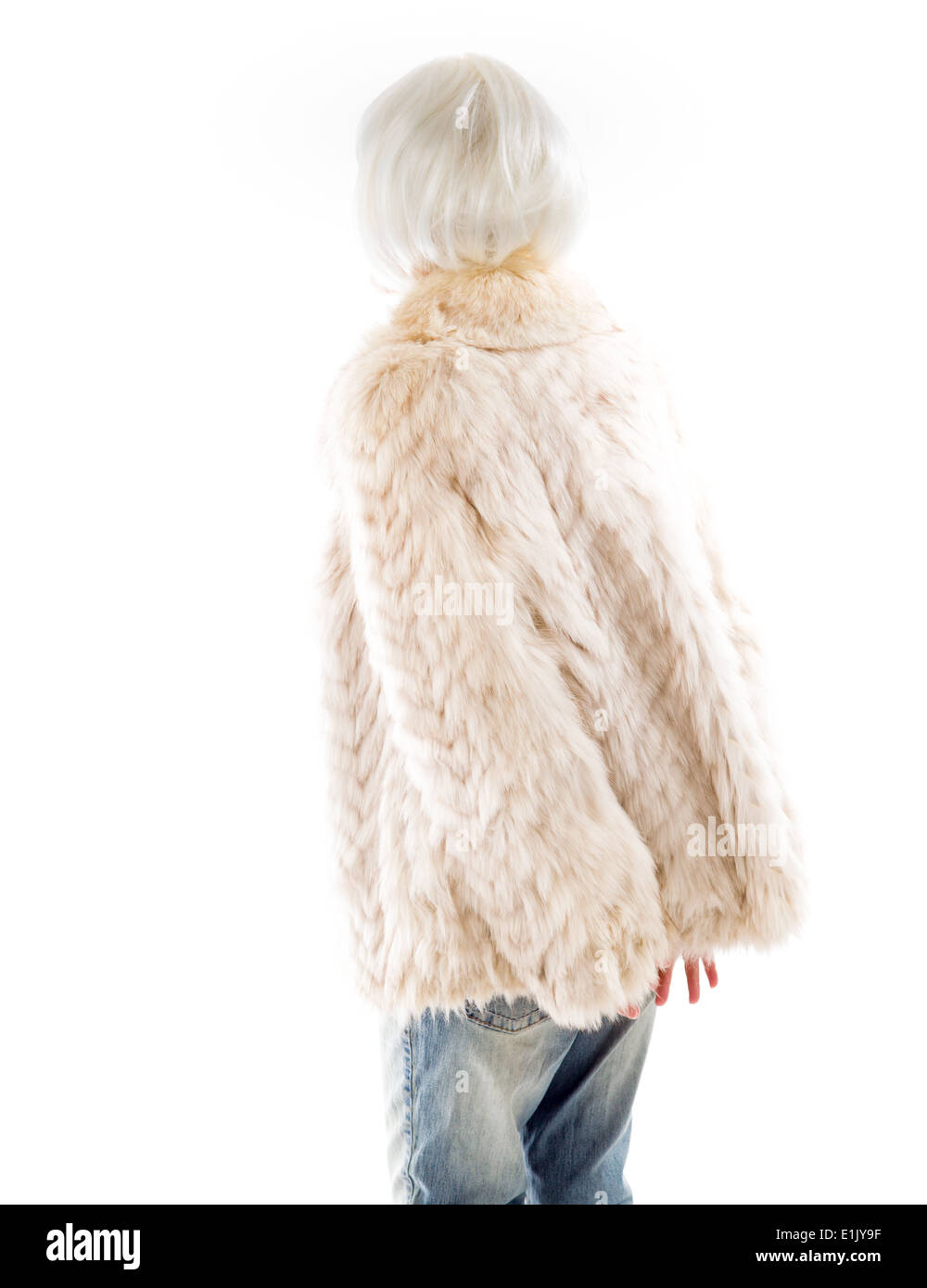 Rear view of a senior woman thinking with her hands behind back Stock ...