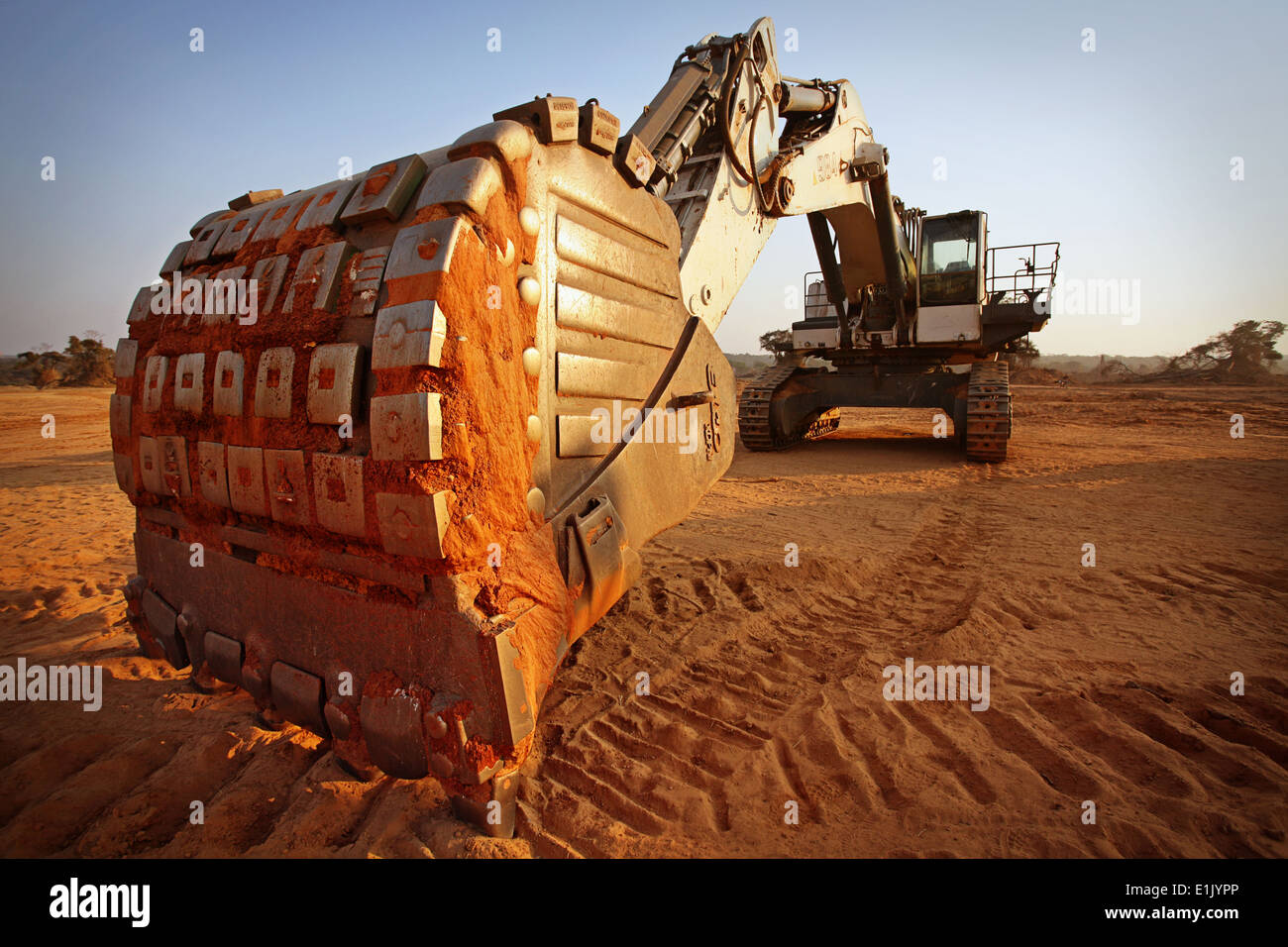 984 Digger excavator at sunset on a copper mine in Zambia Stock Photo