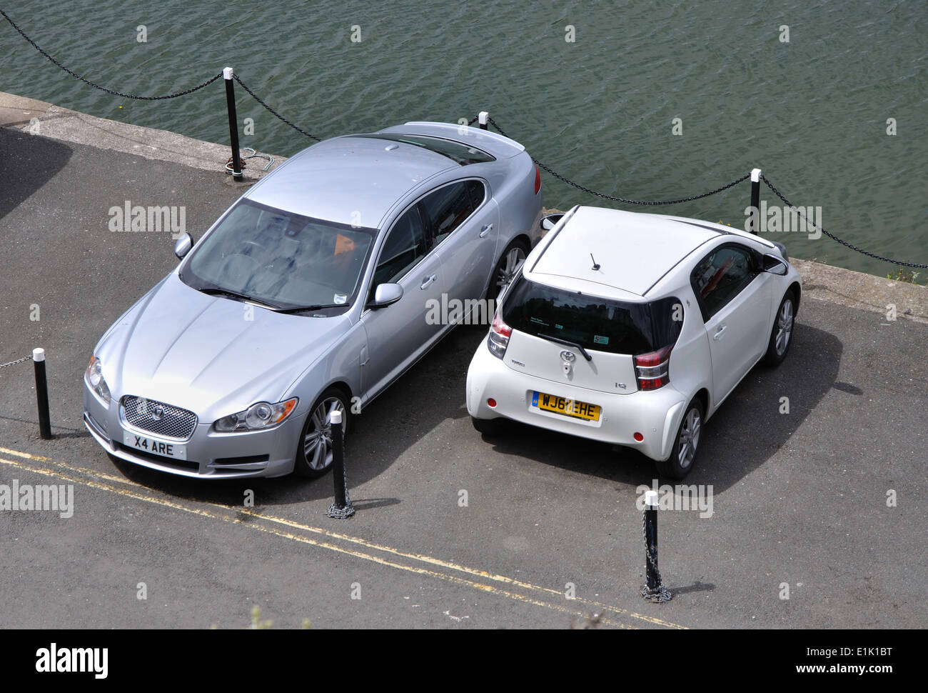 smart car parked on quayside, Brixham, Devon, England, UK Stock Photo