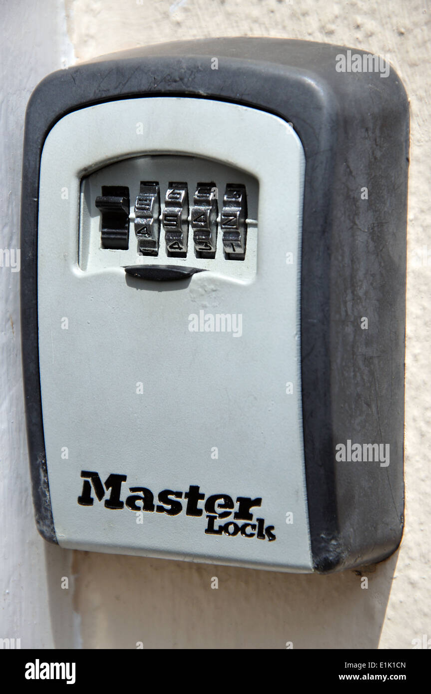 wall mounted Master Lock key safe on holiday cottage, England, UK Stock Photo