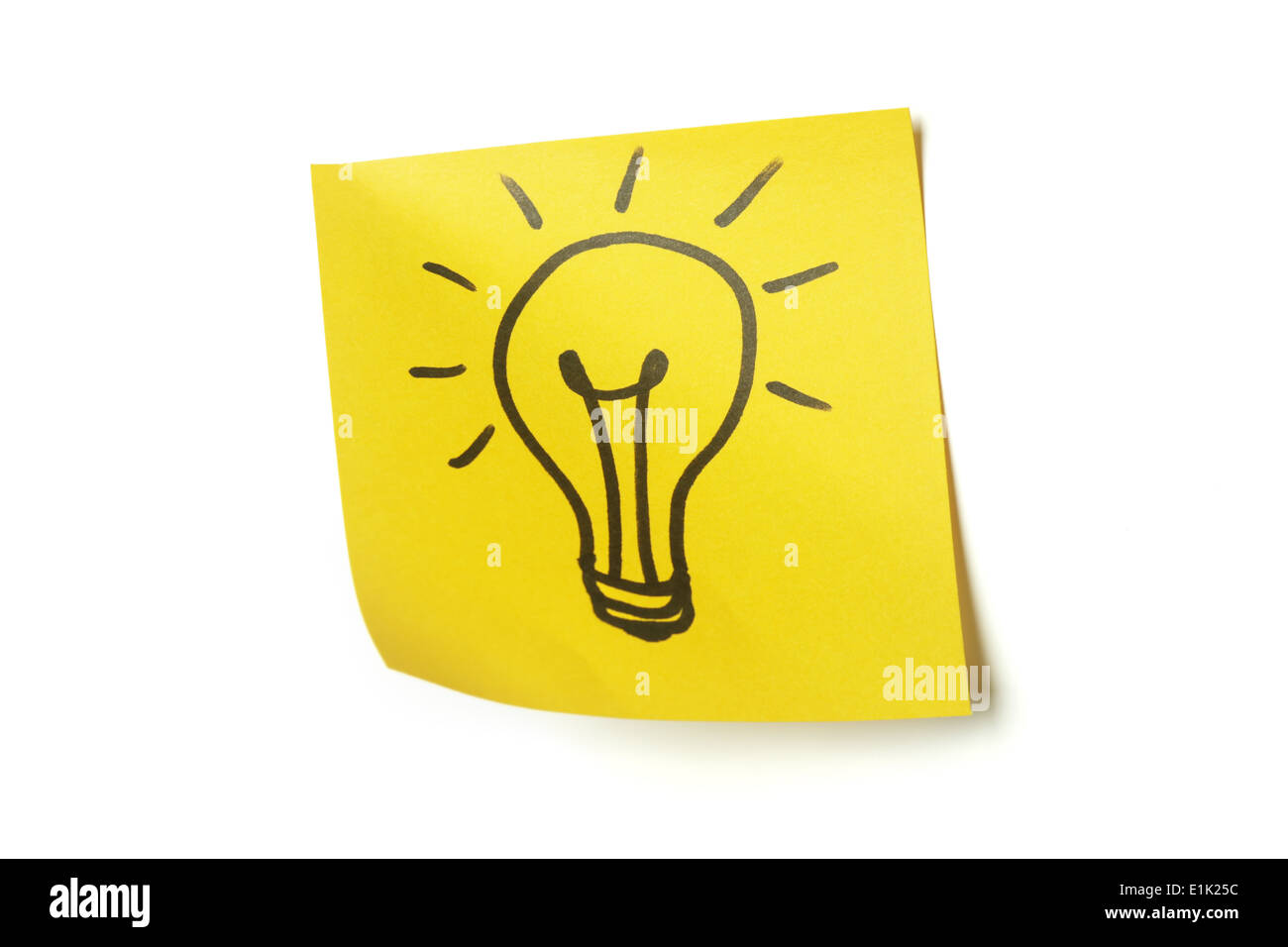 Lightbulb on sticky note Stock Photo