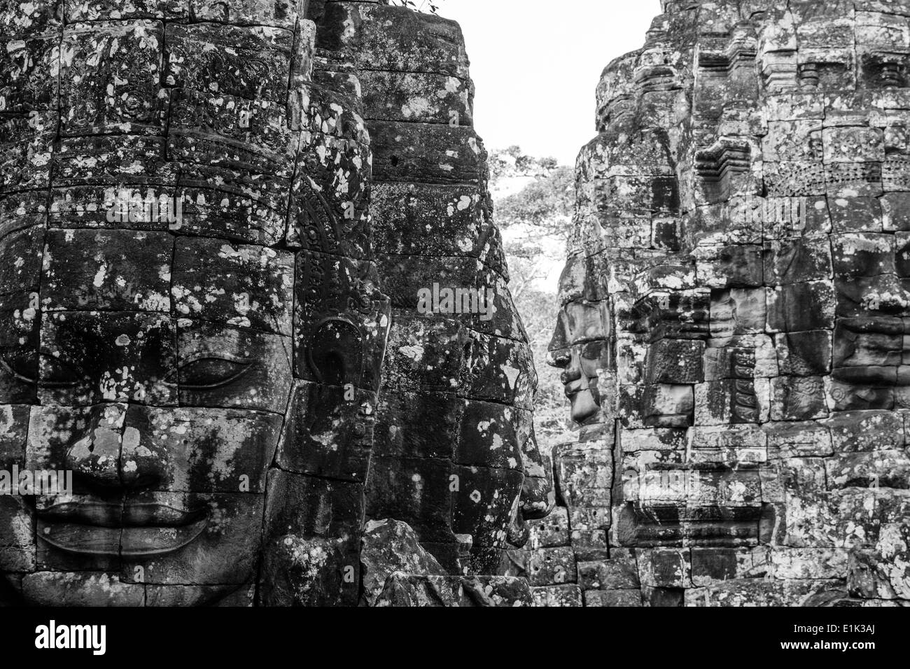 The Bayon is a temple in Angkor Thom, Angkor, Siem Reap, Cambodia. Its key feature are the 216 gigantic stone smiling faces. Stock Photo