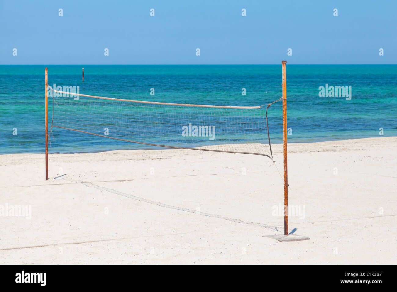 Net for beach volleyball on the sea coast Stock Photo