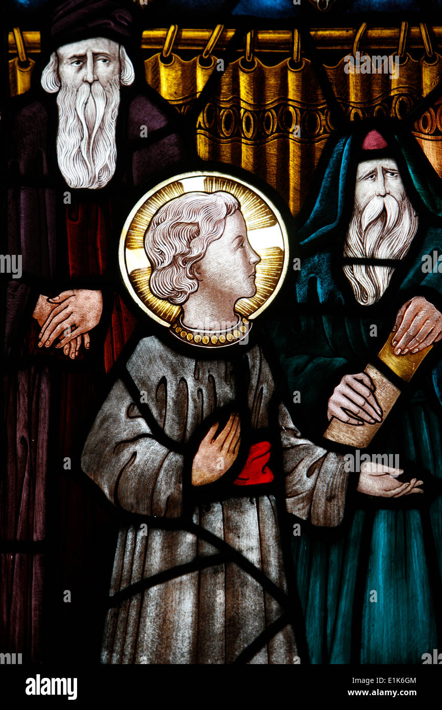 Jesus as a child in the temple with Mary And Joseph. XIX th century. St John's Anglican church. Stock Photo