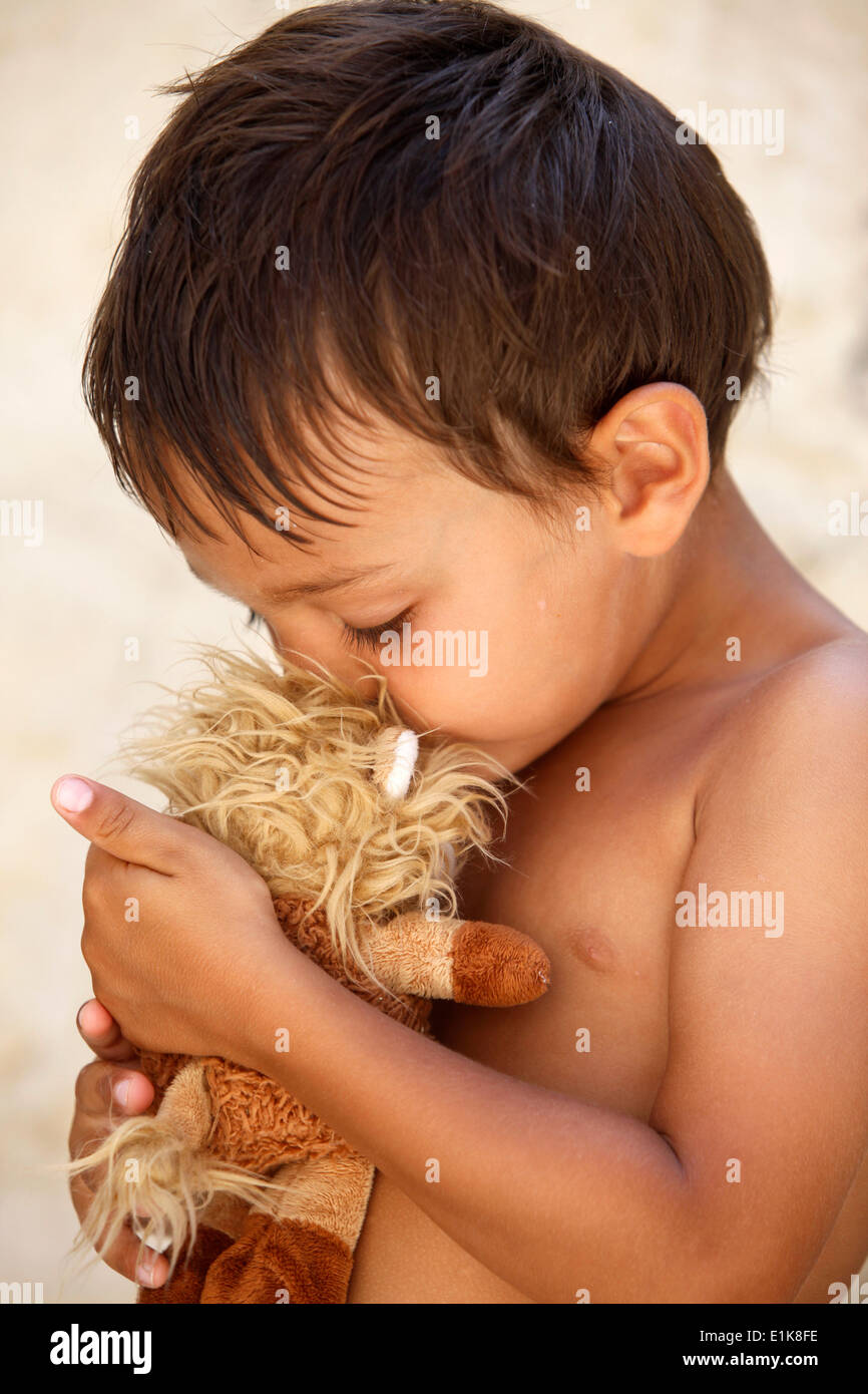 Child with furry toy Stock Photo