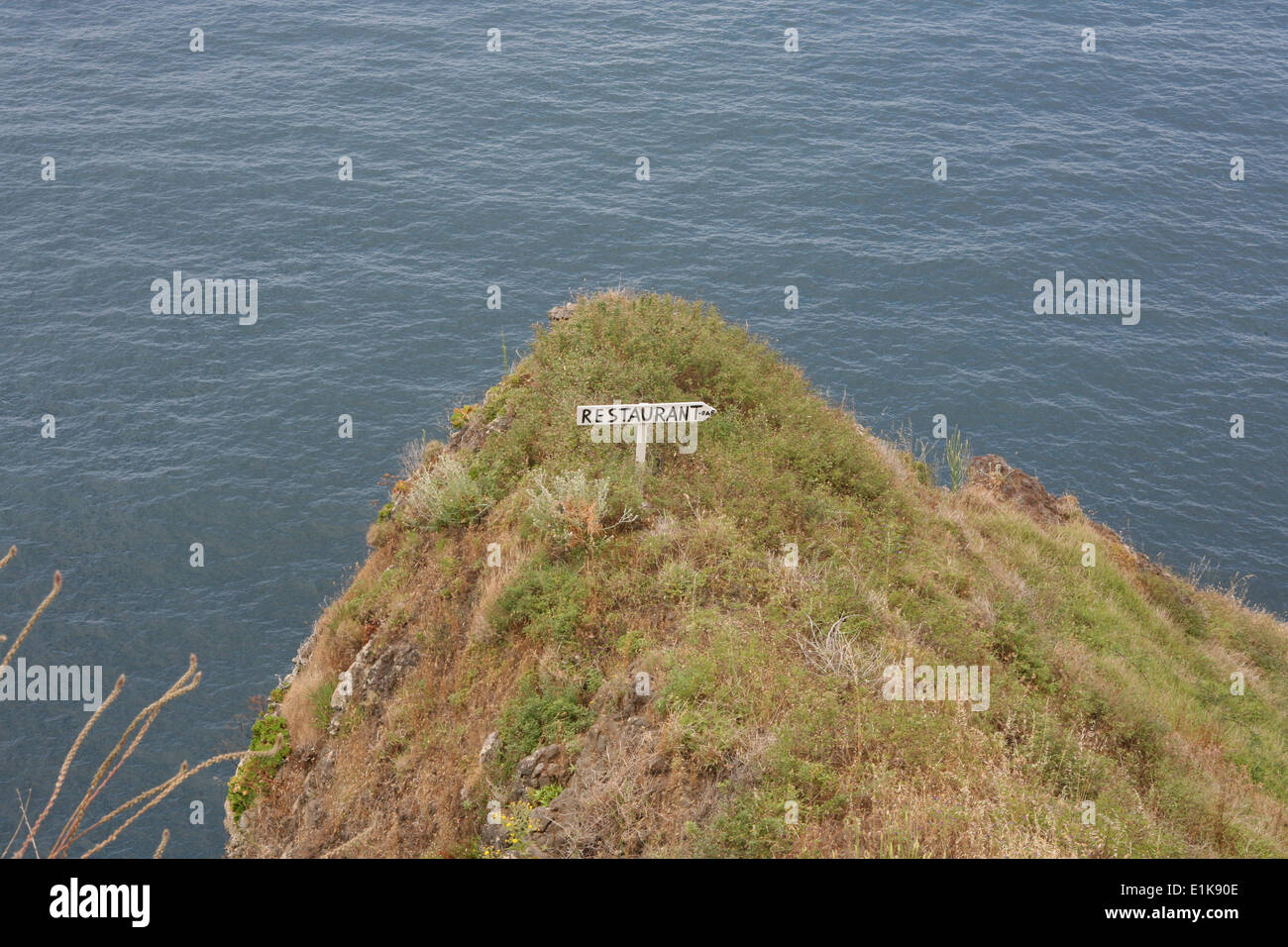 Sign on a cliff Stock Photo
