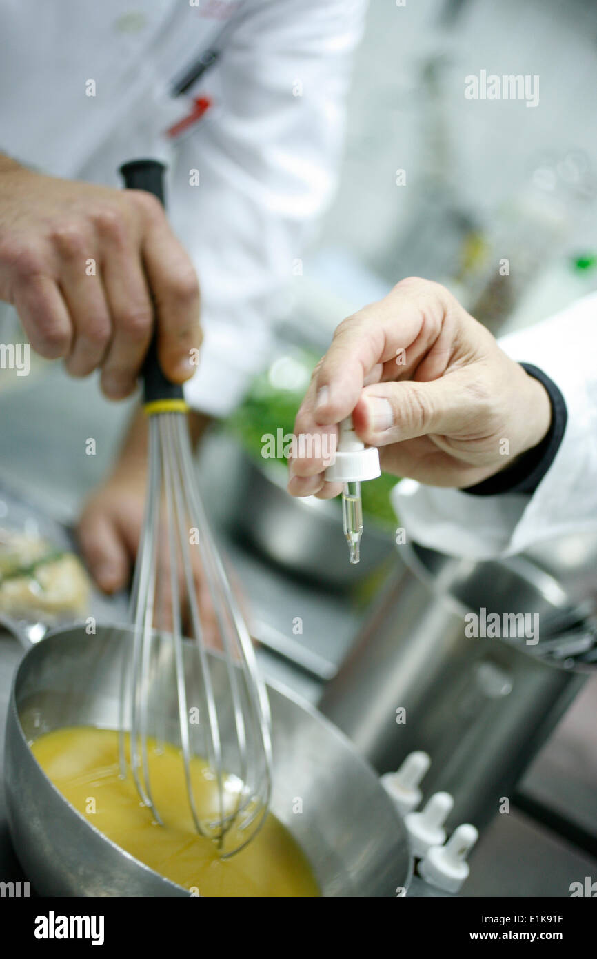 Cooking with essential oil Stock Photo