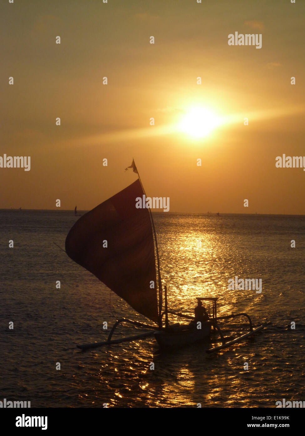 Fishing boat in sunset sea hi-res stock photography and images - Alamy