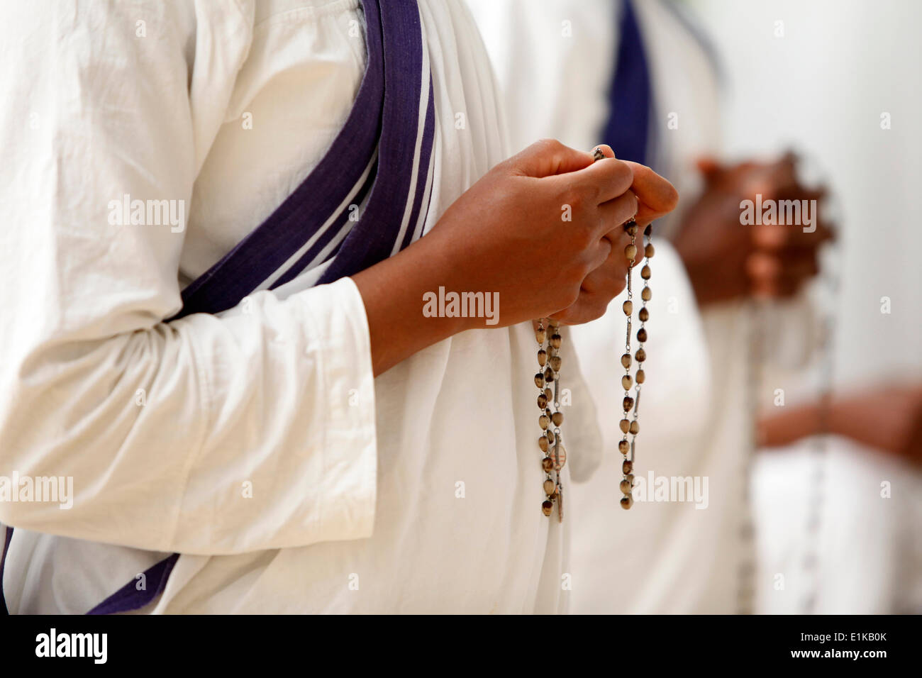 Missionaries of Charity praying Stock Photo