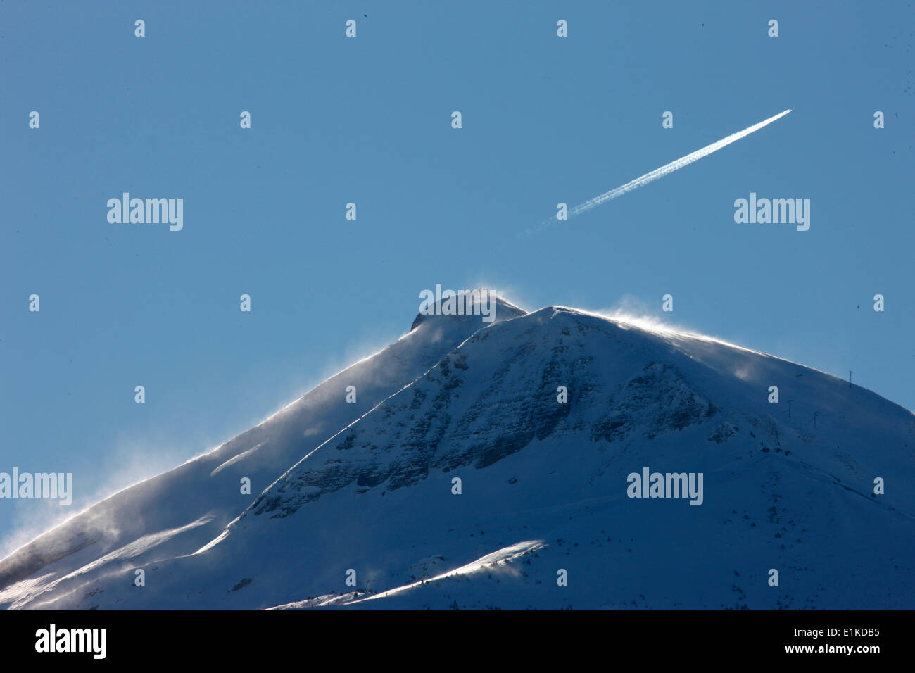 Plane flying over the Mont Joli Stock Photo