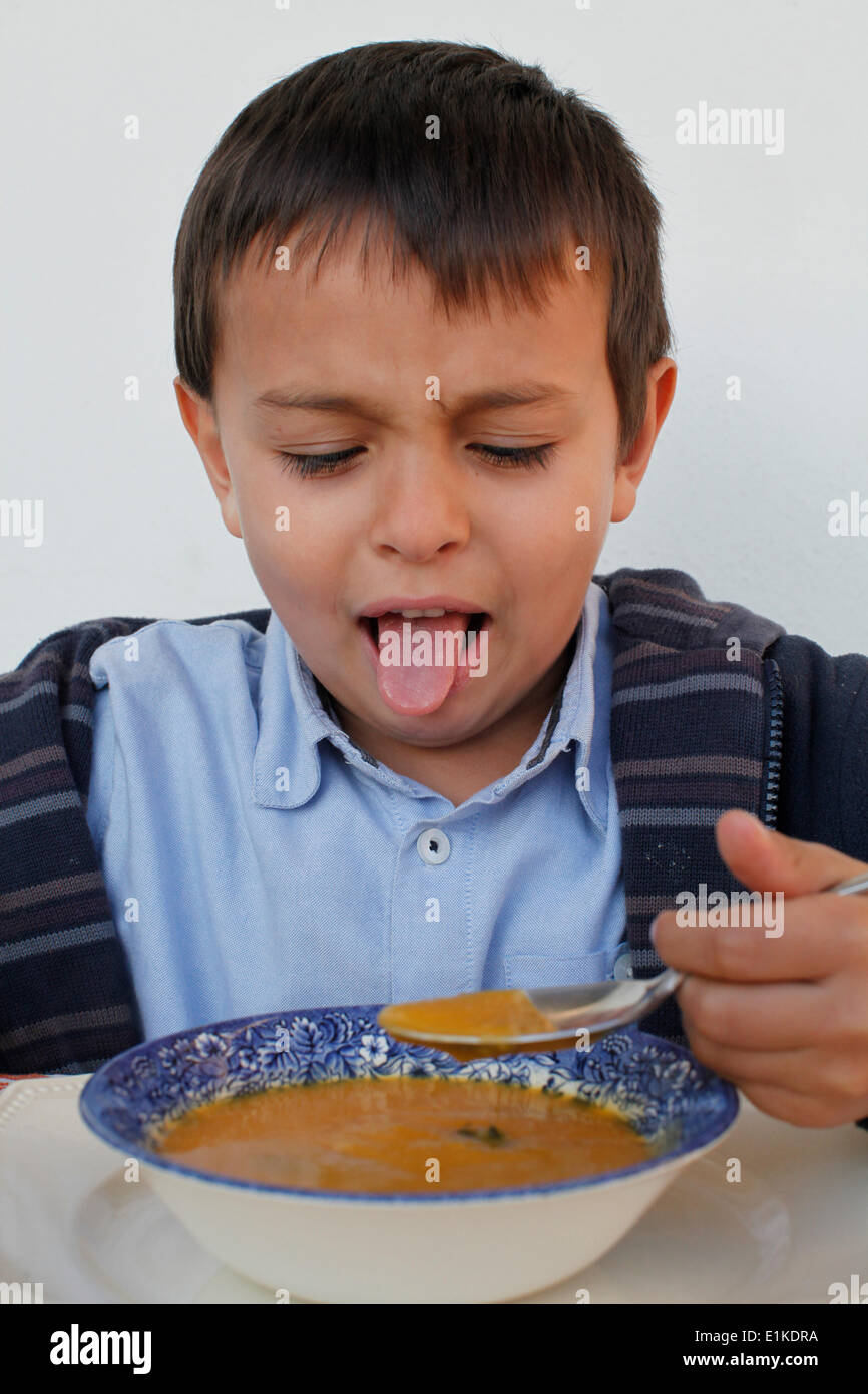 Child eating soup Stock Photo Alamy