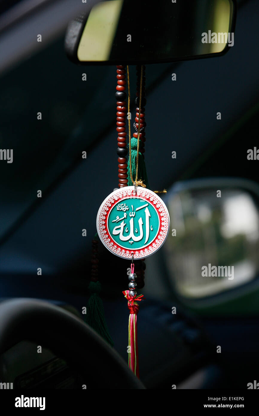 Muslim symbols in a car Stock Photo - Alamy