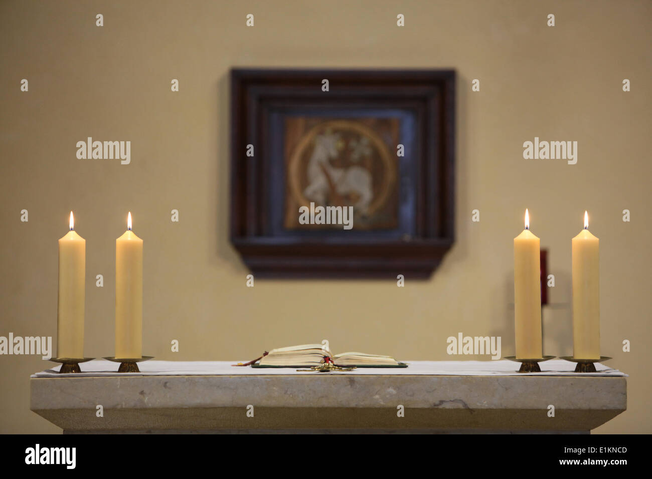 Bible and candles on altar Stock Photo Alamy