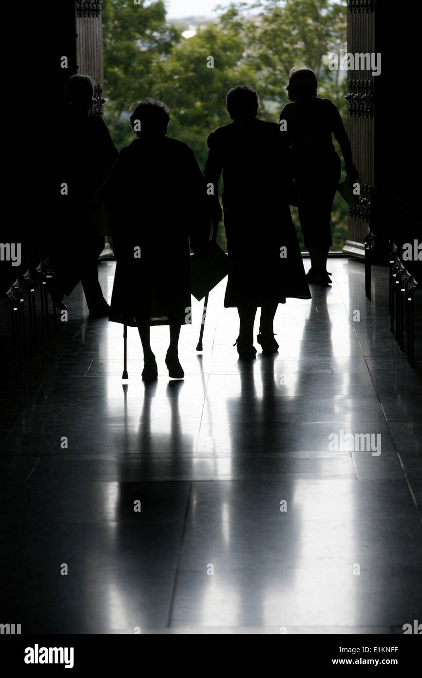 Parishioners leaving church Stock Photo