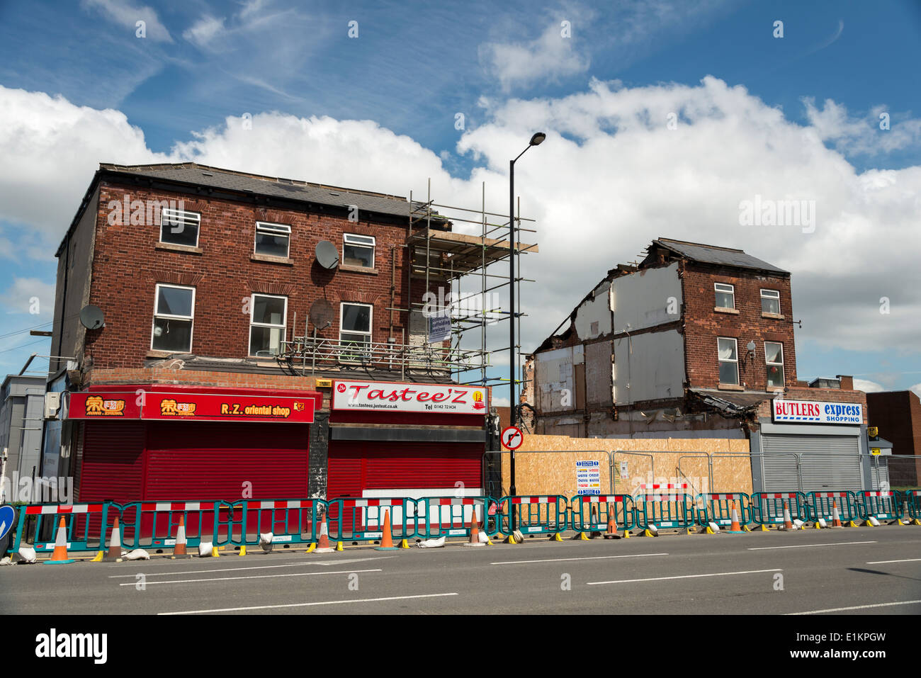 Collapsed building in middle of terrace row in Sheffield city South Yorkshire England Stock Photo