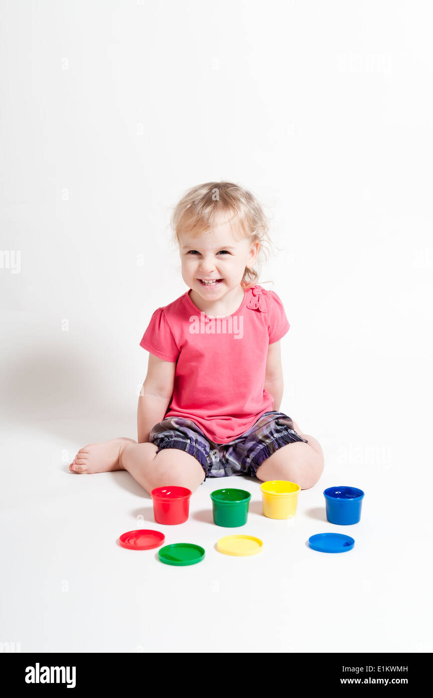 Small child playing with paint hi-res stock photography and images - Alamy