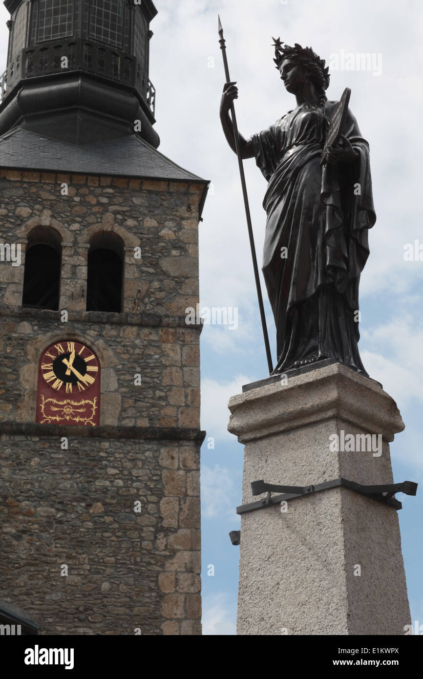 Statue symbolising Republic  next to church spire Stock Photo
