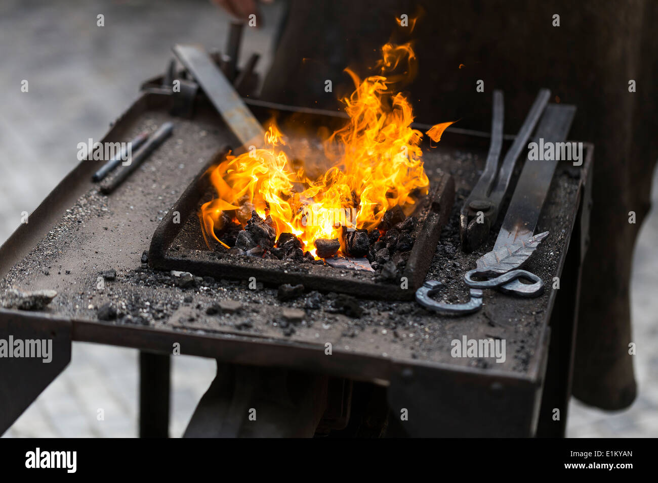 A forge with red flames Stock Photo