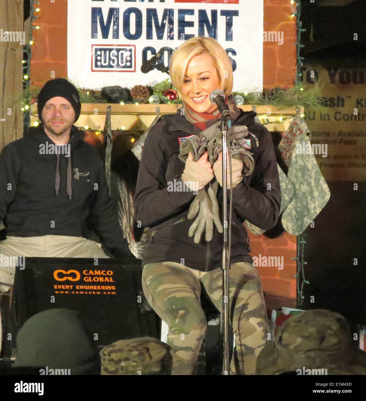 Country music singer Kellie Pickler, front, performs at the boardwalk at Kandahar Airfield, Afghanistan, Dec. 25, 2013, as part Stock Photo