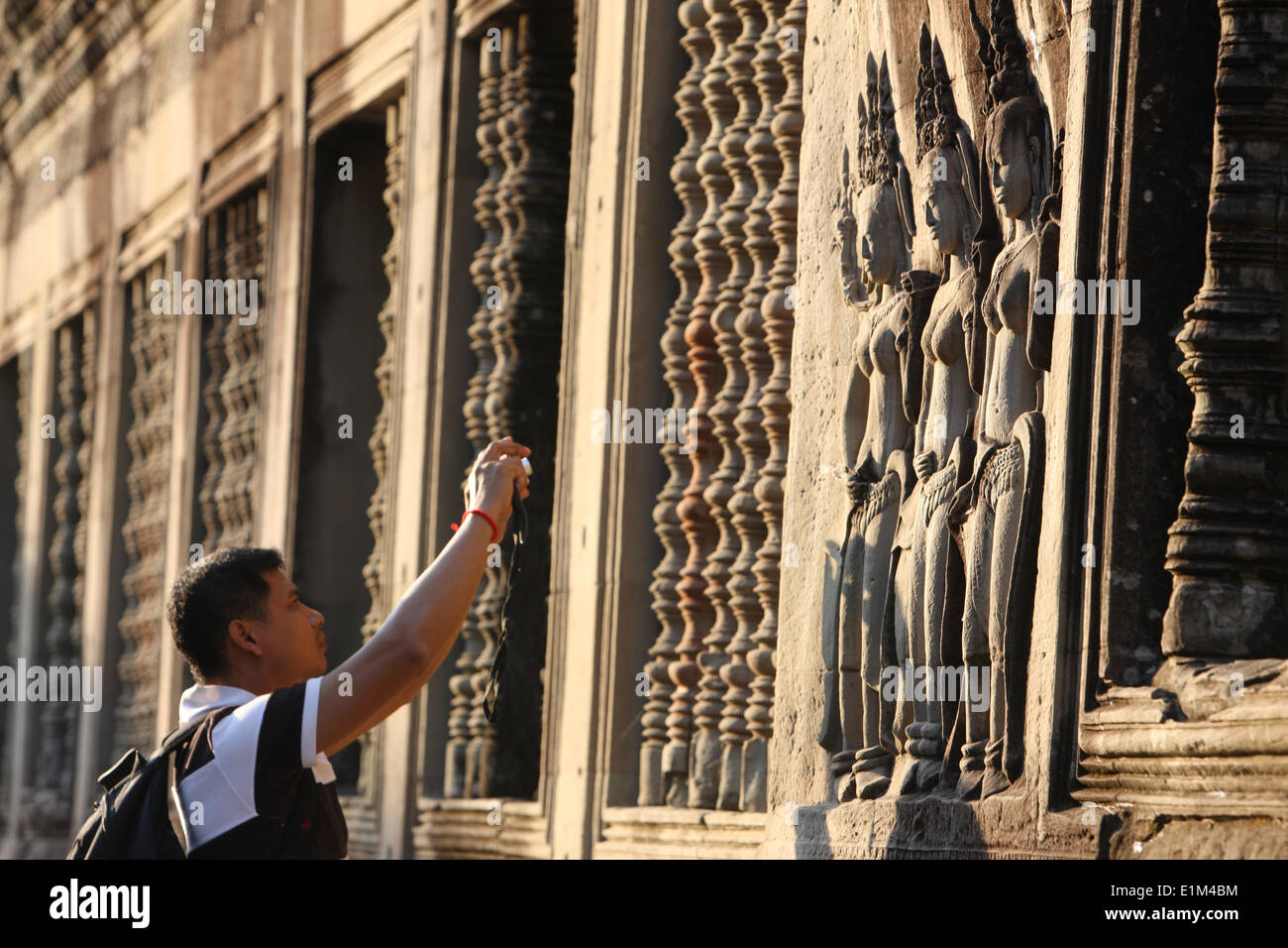 Tourist at Angkor Wat Stock Photo - Alamy
