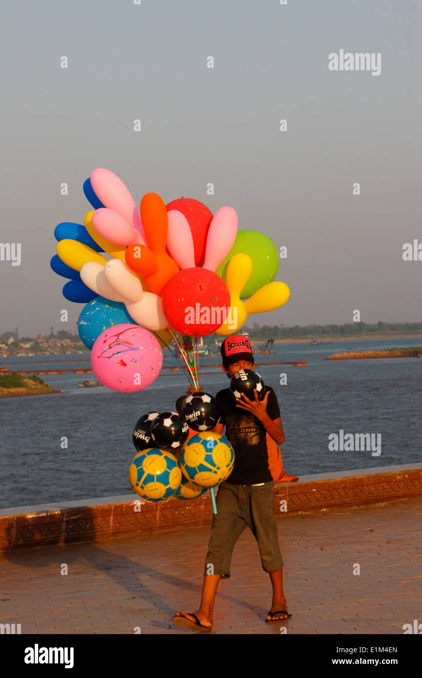 Child selling balloons Stock Photo Alamy